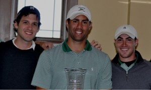 Golfers holding NCCGA trophy