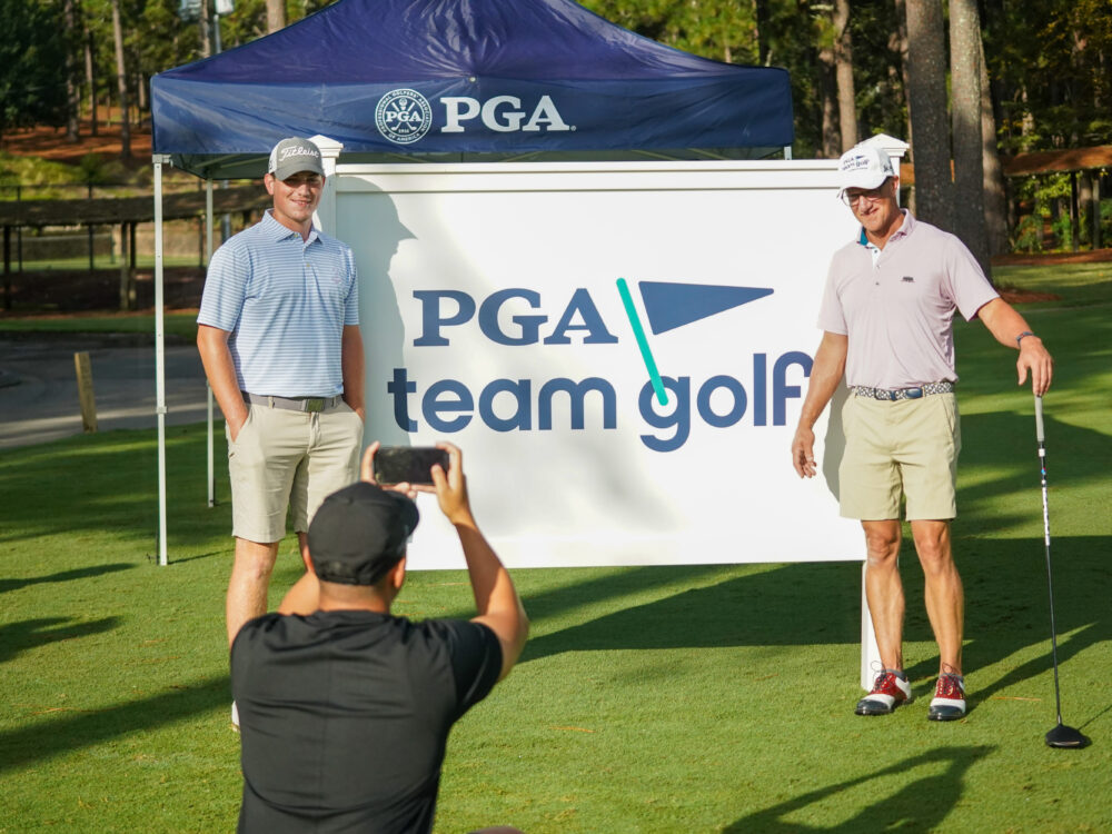 SOUTHERN PINES, NC - September 2: Players take a photo in front of the signage at the PGA Team Golf Championship at Pine Needles Golf Club on September 2, 2023 in Southern Pines, North Carolina. (Photo by Donnelly Wolf/PGA of America)